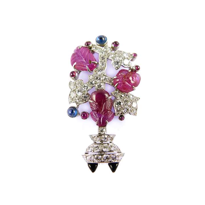 Diamond and carved ruby leaf brooch in the form of a tree or shrub,